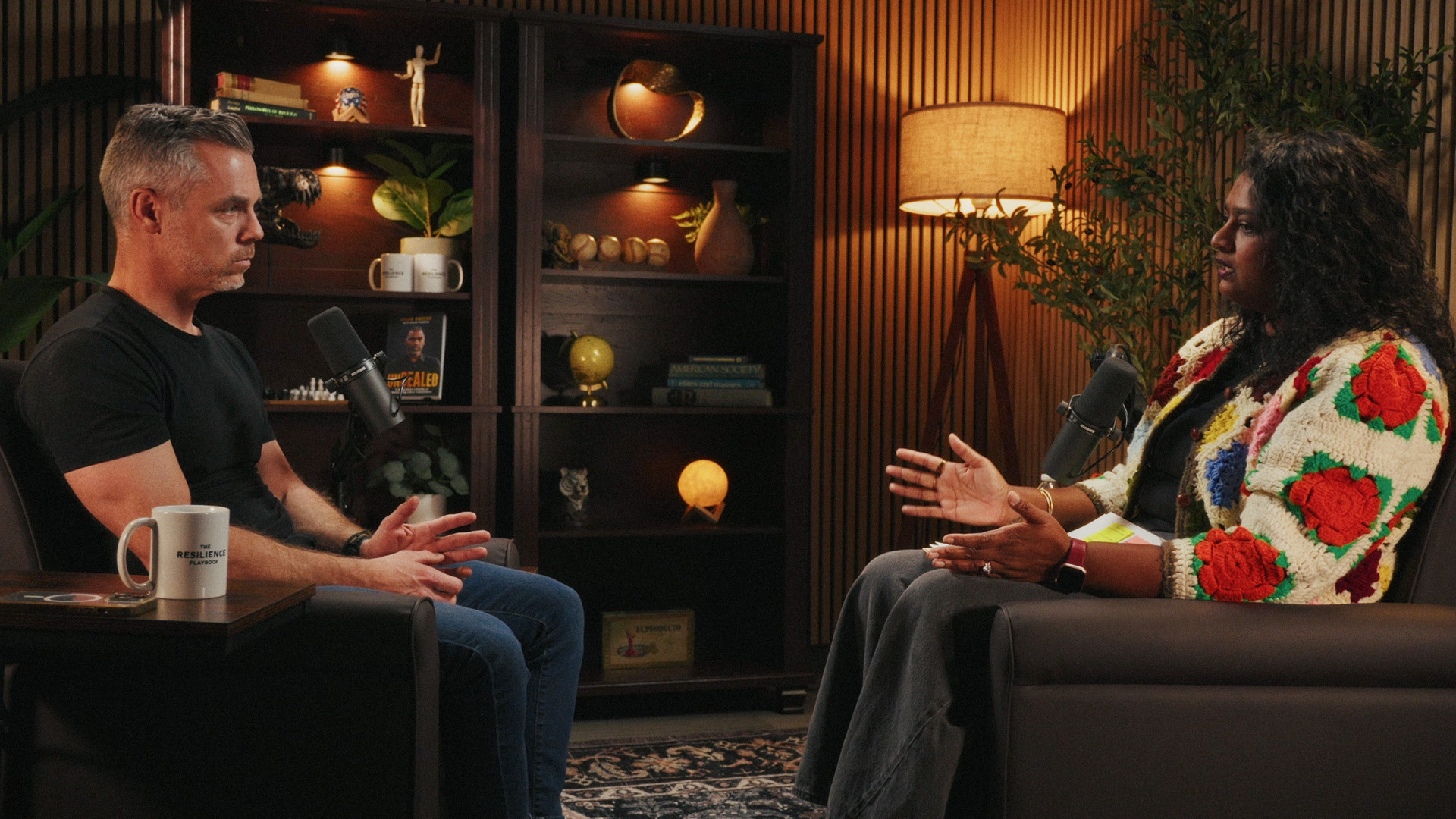 Cole Rodgers and a guest in conversation on the Ethos set